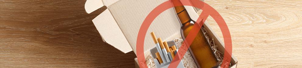 Alcohol and tobacco products in a packing box and crossed out to indicate that they cannot be shipped.